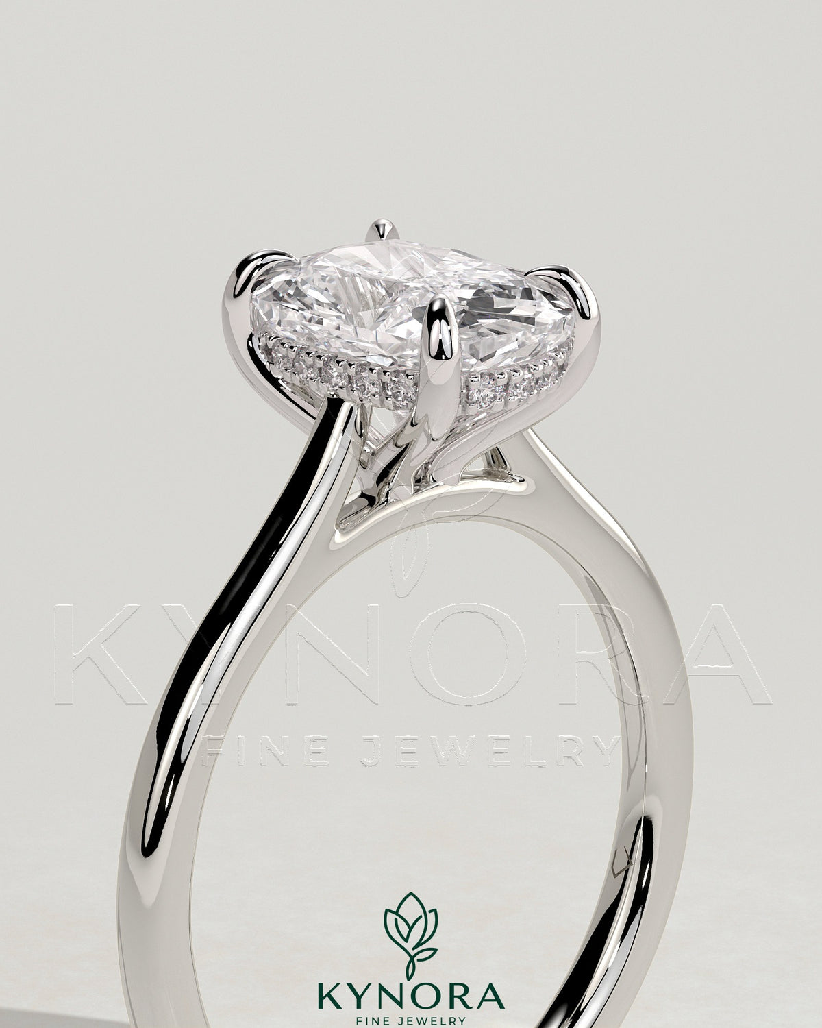 Kynora CJ 2ct elongated cushion cut solitaire engagement ring with hidden halo, tapered band, and cathedral high setting.