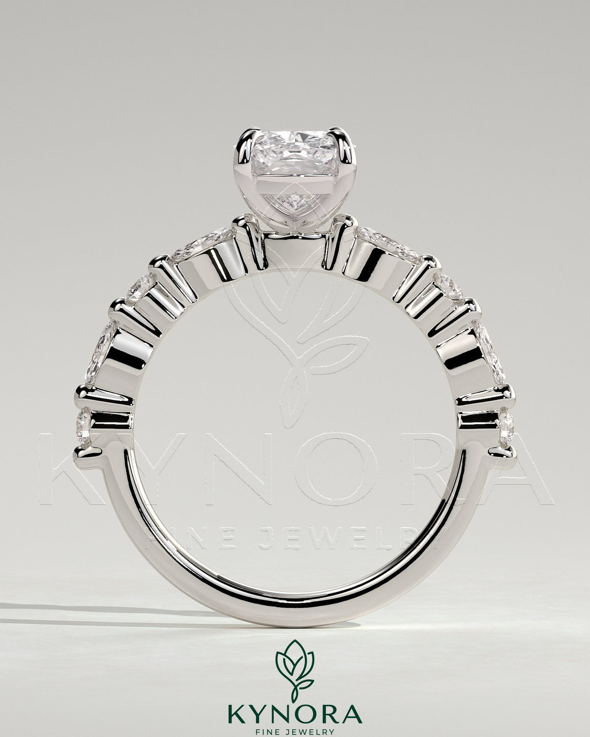 Kynora CJ 2ct elongated cushion solitaire engagement ring with marquise and round accent stones in a elegant setting