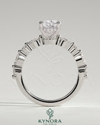 Kynora CJ 2ct elongated cushion solitaire engagement ring with marquise and round accent stones, hidden halo setting.