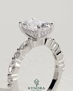 Kynora CJ 2ct elongated cushion claw solitaire engagement ring with marquise-round accent stones and hidden halo setting