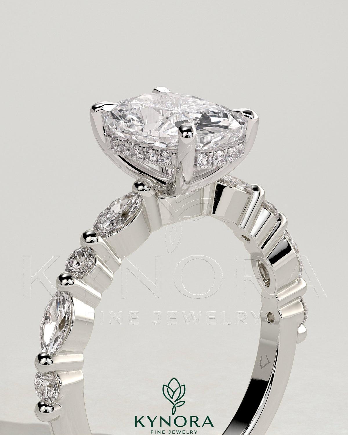 Kynora CJ 2ct elongated cushion claw solitaire engagement ring with marquise-round accent stones and hidden halo setting