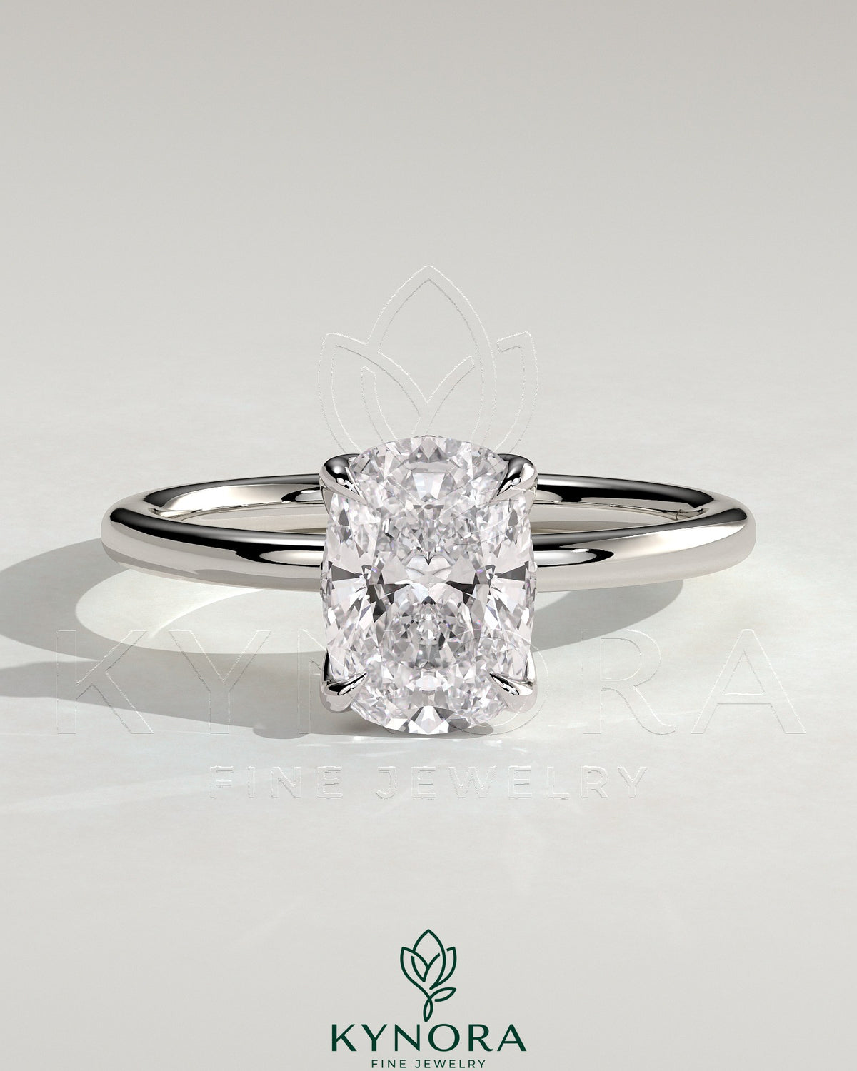 Kynora CJ 2ct elongated cushion claw solitaire engagement ring with petal gallery and accented tiara detail, featuring a sparkling diamond.