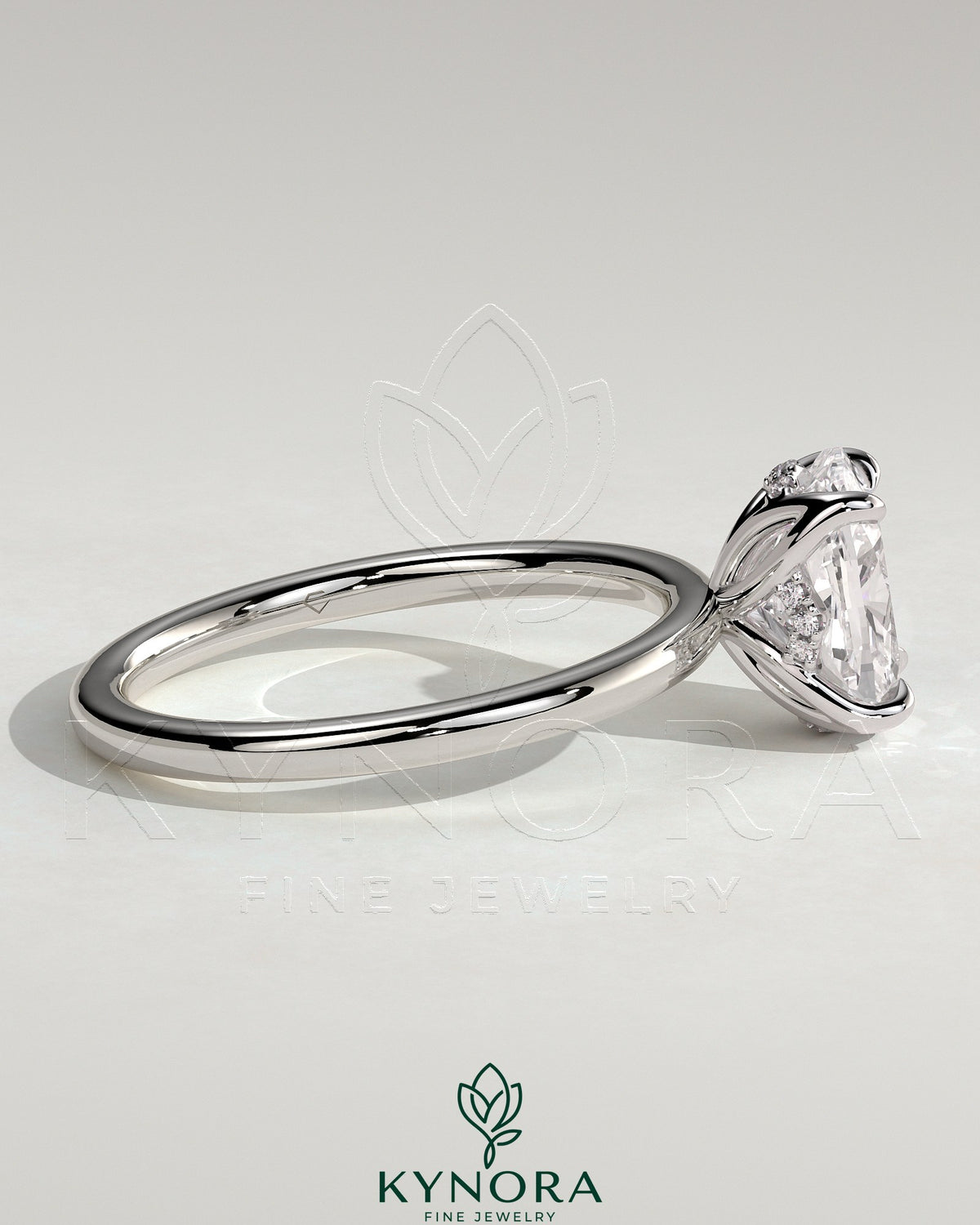 Kynora CJ 2ct elongated cushion cut solitaire engagement ring with petal gallery and accented tiara detail, showcasing intricate design.