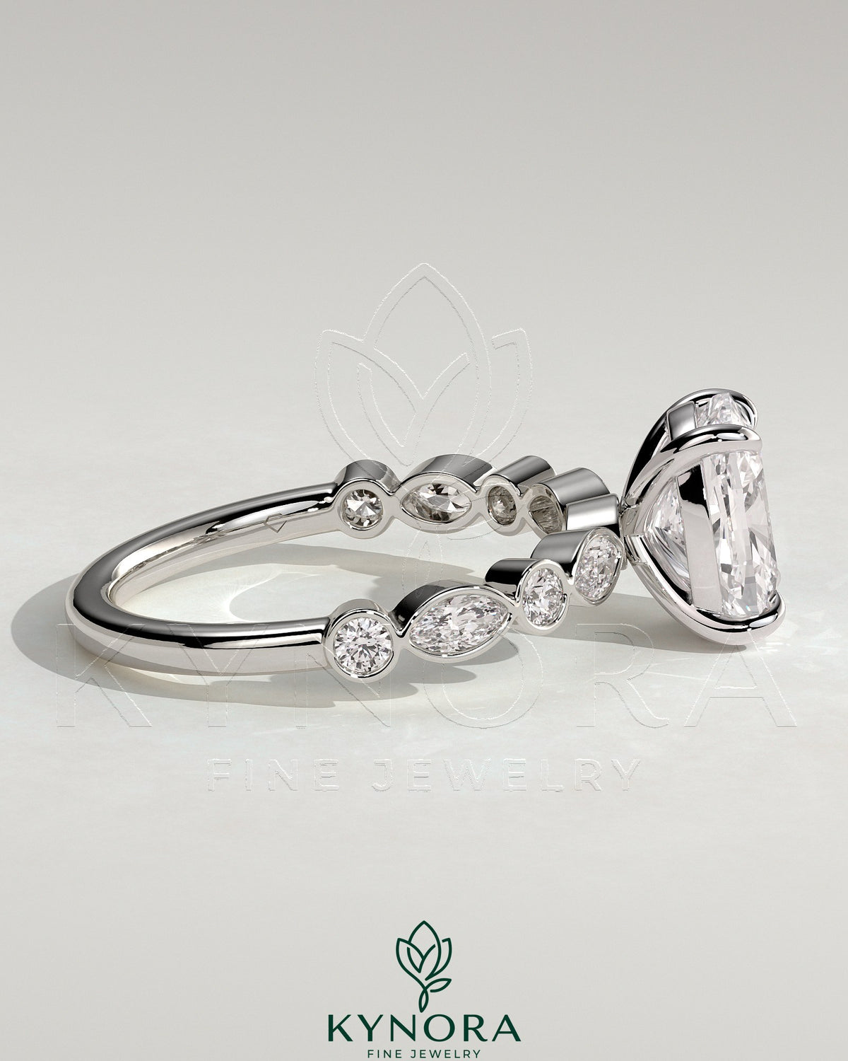 Kynora CJ 2ct elongated cushion claw solitaire engagement ring with round-marquise bezel accent stones in sterling silver.