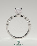 Kynora CJ 2ct elongated cushion claw solitaire engagement ring with round and marquise bezel accent stones on a silver band