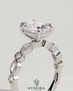 Kynora CJ 2ct elongated cushion claw solitaire engagement ring with round-marquise bezel accent stones, featuring a sparkling diamond design.
