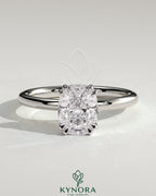 Kynora CJ 2ct elongated cushion double claw solitaire engagement ring with hidden halo, featuring a sparkling center stone.