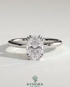 Kynora CJ 2ct elongated cushion cut diamond solitaire engagement ring with triple claw setting, elegant and sparkling jewelry piece
