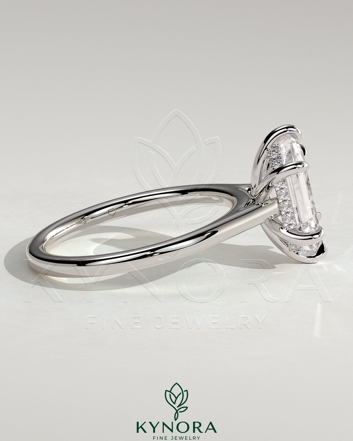 Kynora CJ 2ct elongated hexagon diamond solitaire engagement ring with hidden halo and cathedral high setting.