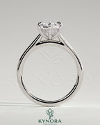 Kynora CJ 2ct elongated hexagon claw solitaire engagement ring with hidden halo and cathedral high setting, showcasing intricate design.