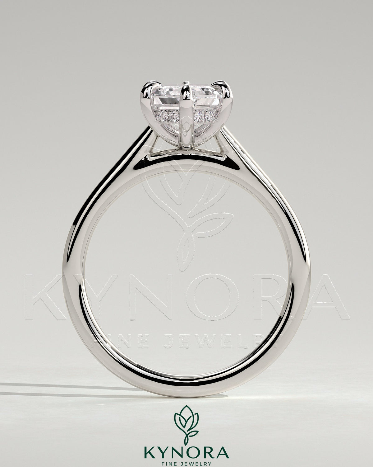 Kynora CJ 2ct elongated hexagon claw solitaire engagement ring with hidden halo and cathedral high setting, showcasing intricate design.