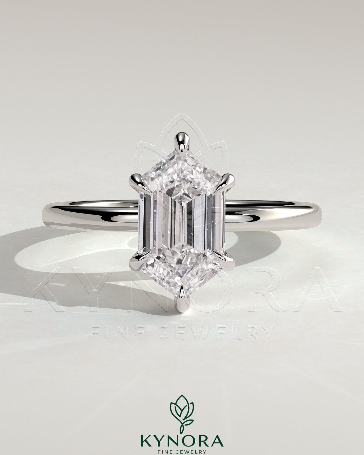 Kynora CJ 2ct elongated hexagon claw solitaire engagement ring with hidden halo, featuring a sparkling gemstone and elegant design. Imagen principal del producto