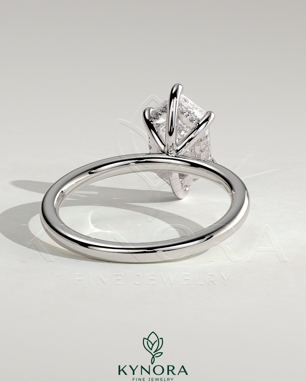 Kynora CJ 2ct elongated hexagon claw solitaire engagement ring with hidden halo showcasing the detailed design and sparkling diamond.
