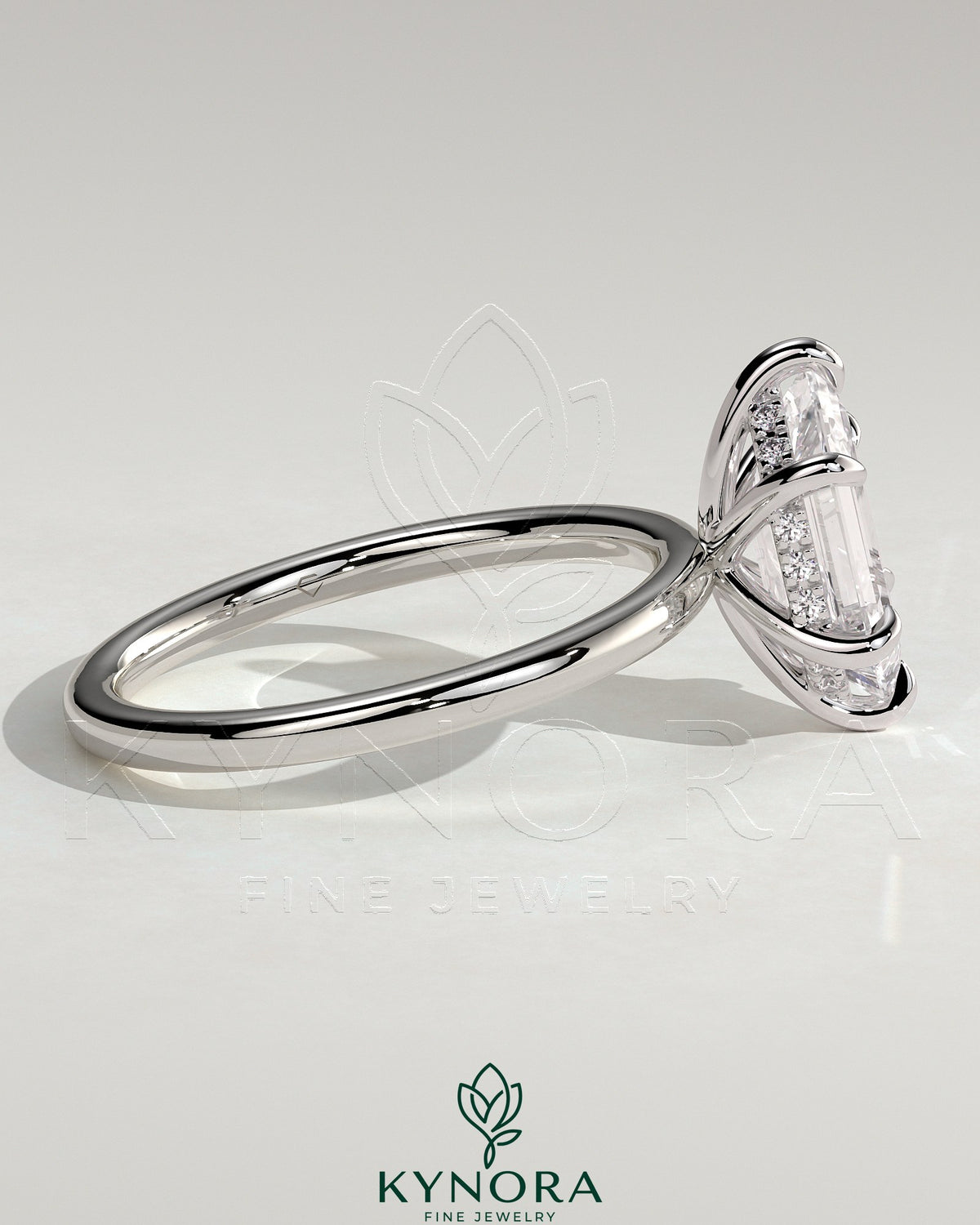 Kynora CJ 2ct elongated hexagon claw solitaire engagement ring with hidden halo, featuring a sparkling diamond setting.