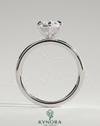 Kynora CJ 2ct elongated hexagon claw solitaire engagement ring with hidden halo, featuring a sparkling central diamond.