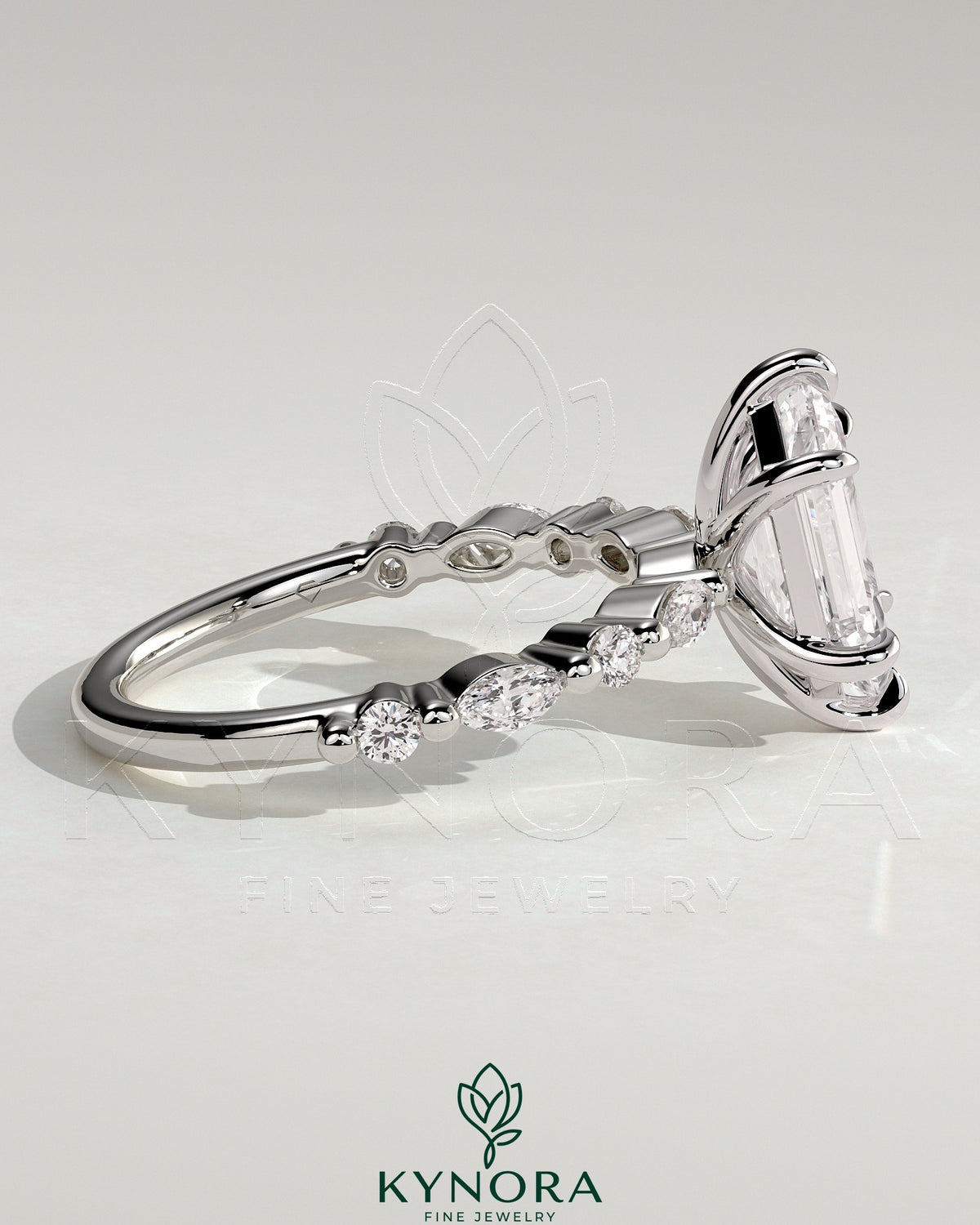 Kynora CJ 2ct elongated hexagon claw solitaire engagement ring with marquise and round accent stones, elegant jewelry design