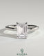 Kynora CJ 2-carat emerald claw solitaire engagement ring with a single emerald-cut diamond on a sleek band