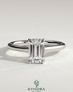 Kynora CJ 2ct emerald claw solitaire engagement ring with hidden halo and cathedral high setting, showcasing intricate diamond details.