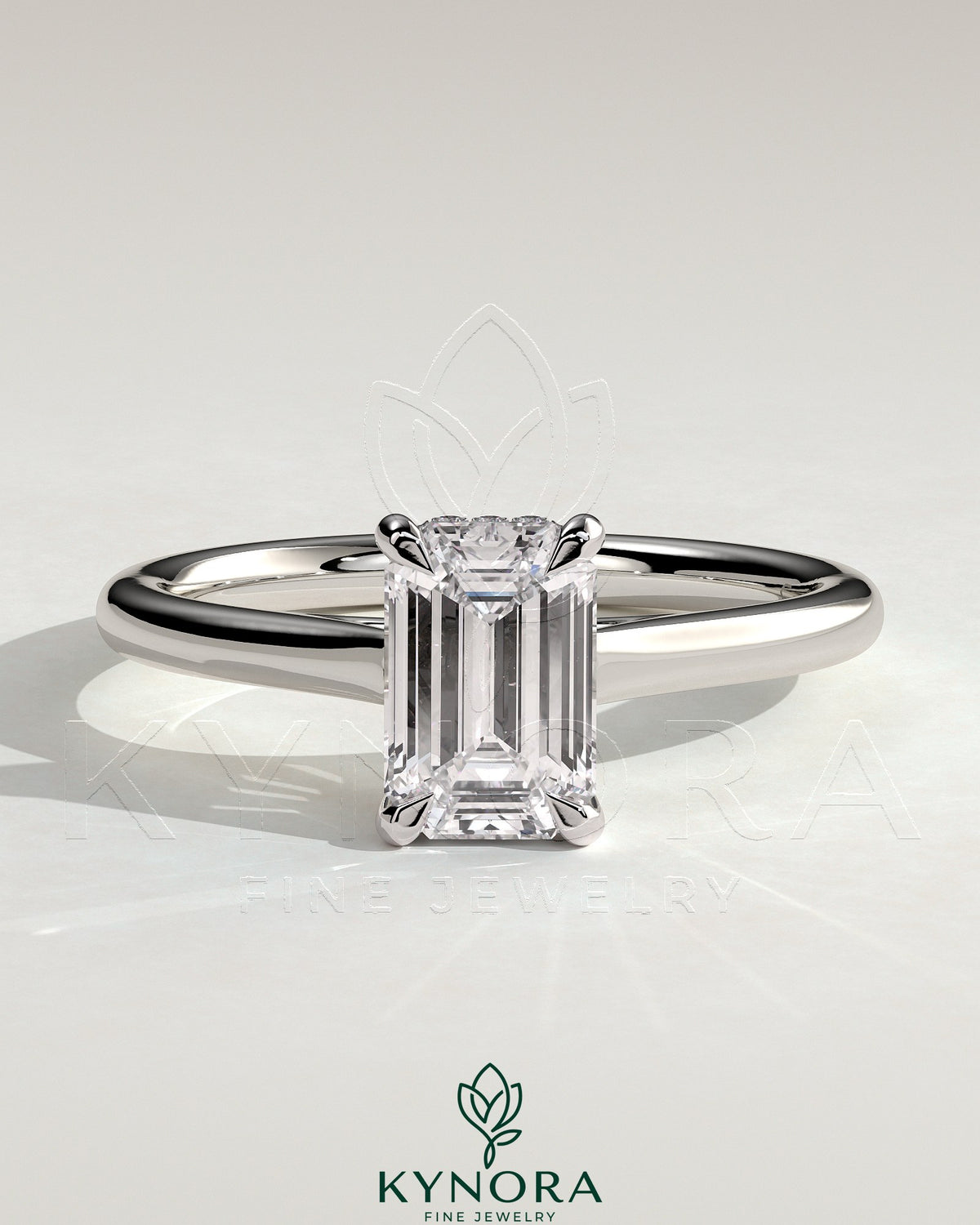 Kynora CJ 2ct emerald claw solitaire engagement ring with hidden halo and cathedral high setting, showcasing intricate diamond details.