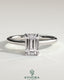 Kynora CJ 2ct emerald claw solitaire engagement ring with hidden halo and cathedral high setting, showcasing intricate diamond details.