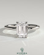 Kynora CJ 2ct emerald claw solitaire engagement ring with hidden halo and floating cathedral low setting, showcasing intricate design.