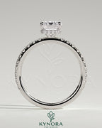Kynora CJ 2ct emerald claw solitaire engagement ring with wrap-around hidden halo and pave band, detailed jewelry image