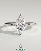 Kynora CJ 2ct marquise diamond solitaire engagement ring with four prongs in a classic solitaire style.