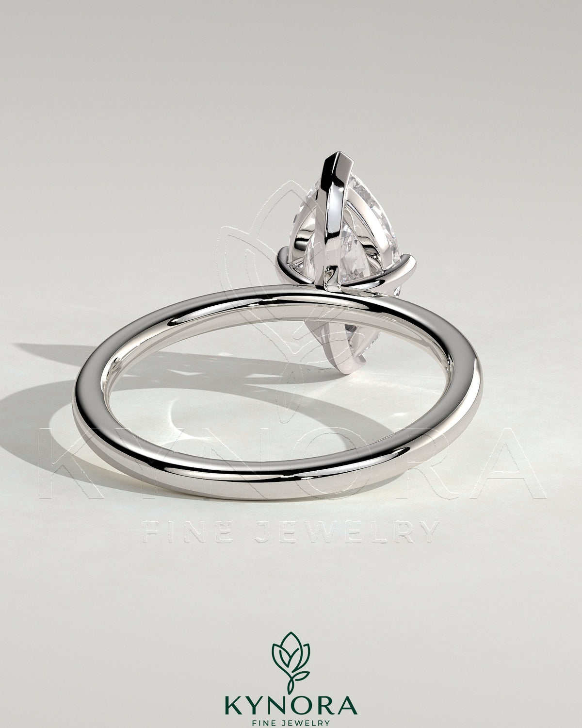 Kynora CJ 2ct marquise diamond solitaire engagement ring with four-prong setting, elegant and classic jewelry design.