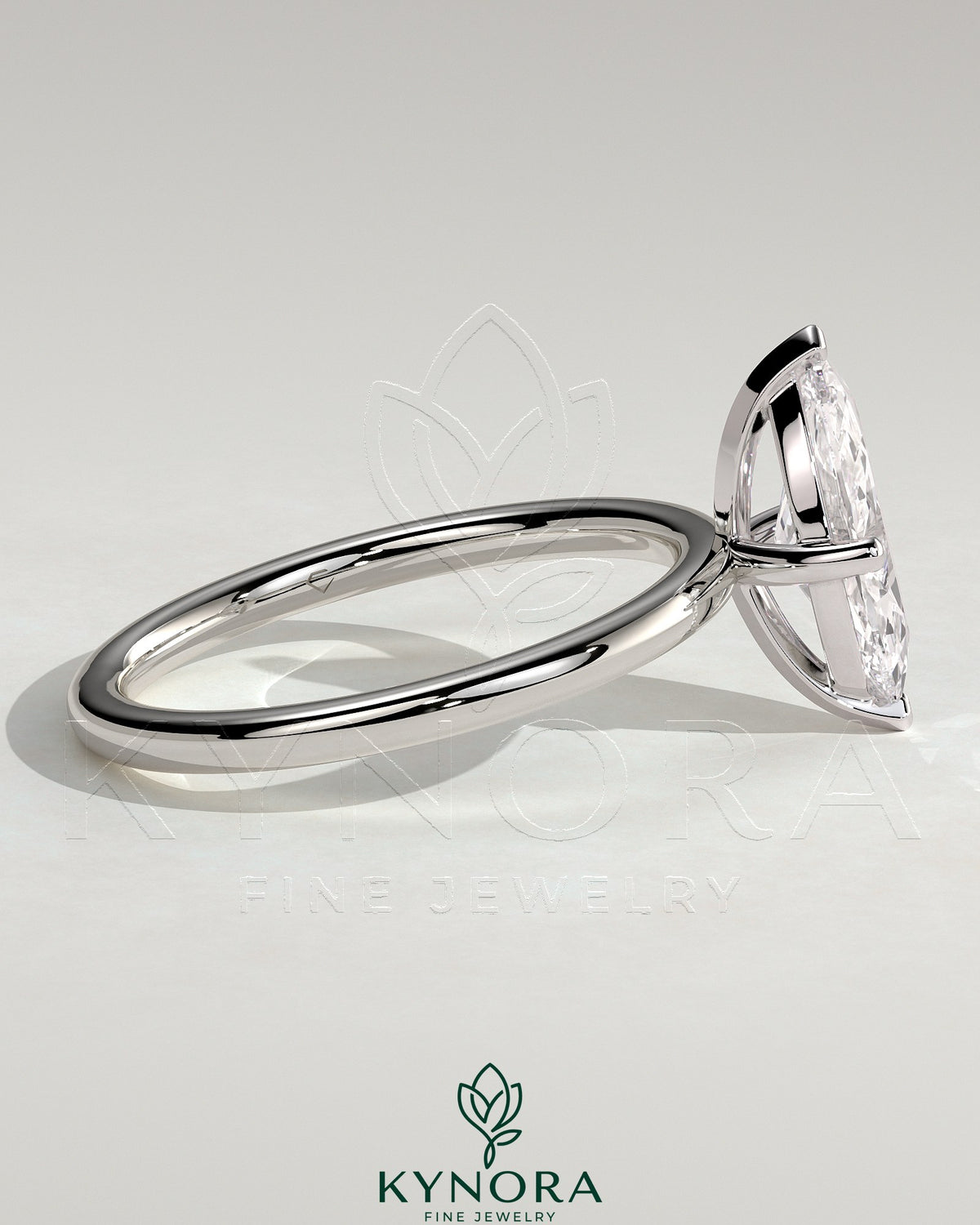Kynora CJ 2ct marquise cut solitaire engagement ring with four prongs, showcasing elegant diamond setting and craftsmanship.