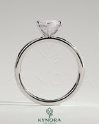 Kynora CJ 2ct marquise claw solitaire engagement ring with four prongs, featuring a sparkling marquise-cut diamond.