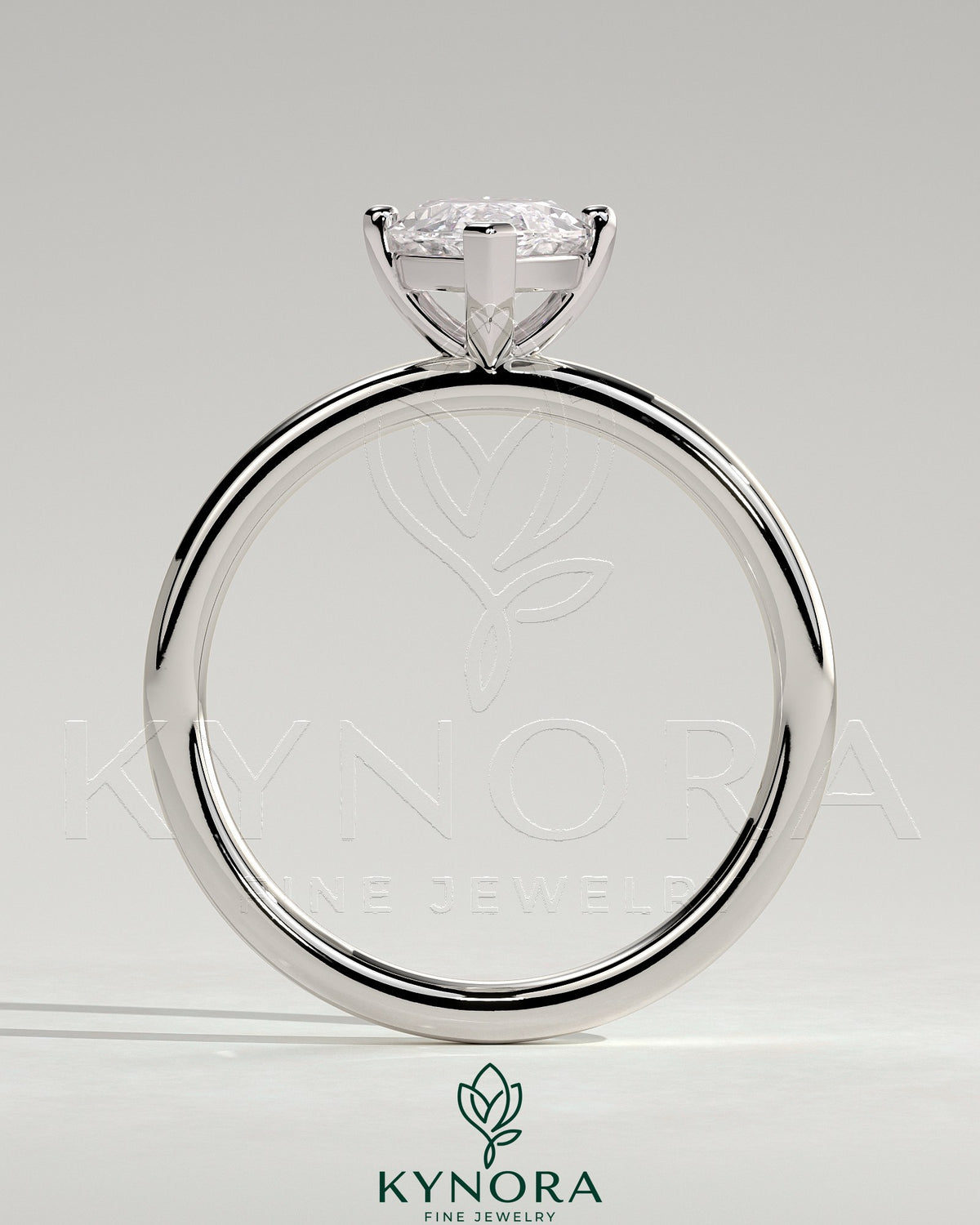 Kynora CJ 2ct marquise claw solitaire engagement ring with four prongs, featuring a sparkling marquise-cut diamond.