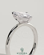 Kynora CJ 2ct marquise diamond solitaire engagement ring with four prongs and classic setting.