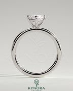 Kynora CJ 2ct marquise claw solitaire engagement ring with hidden halo, featuring a sleek platinum band and sparkling diamond details.