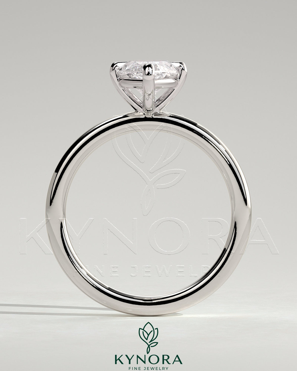 Kynora CJ 2ct marquise claw solitaire engagement ring with hidden halo, featuring a sleek platinum band and sparkling diamond details.