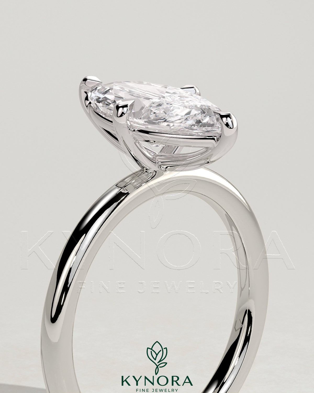 Kynora CJ 2ct marquise solitaire engagement ring with hidden halo, featuring a sleek design and sparkling diamond details.