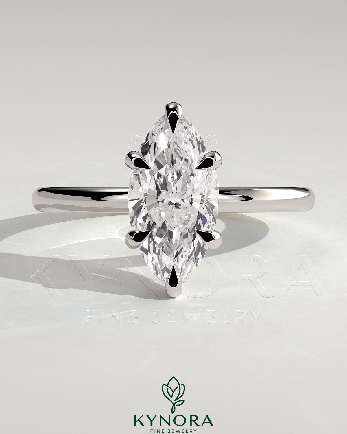Kynora CJ 2ct marquise cut solitaire engagement ring with six prongs and claw setting, showcasing elegant jewelry craftsmanship.