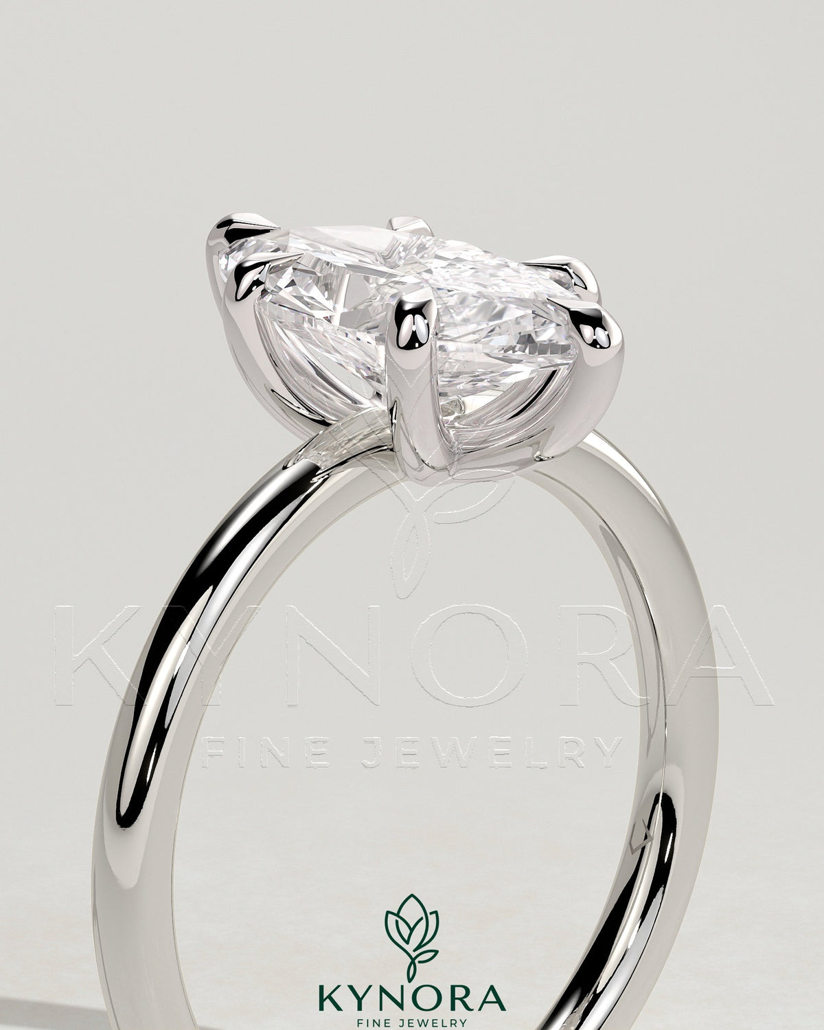 Kynora CJ 2ct marquise diamond solitaire engagement ring with six-prong setting and claw design, showcasing elegant jewelry craftsmanship.