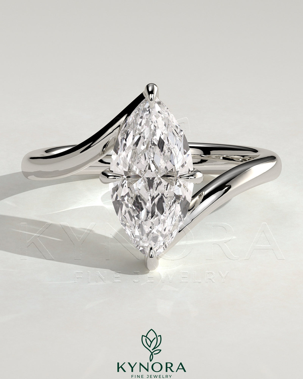 Kynora CJ 2ct marquise claw solitaire engagement ring with bypass band, showcasing a sparkling marquise-cut diamond and sleek band design.