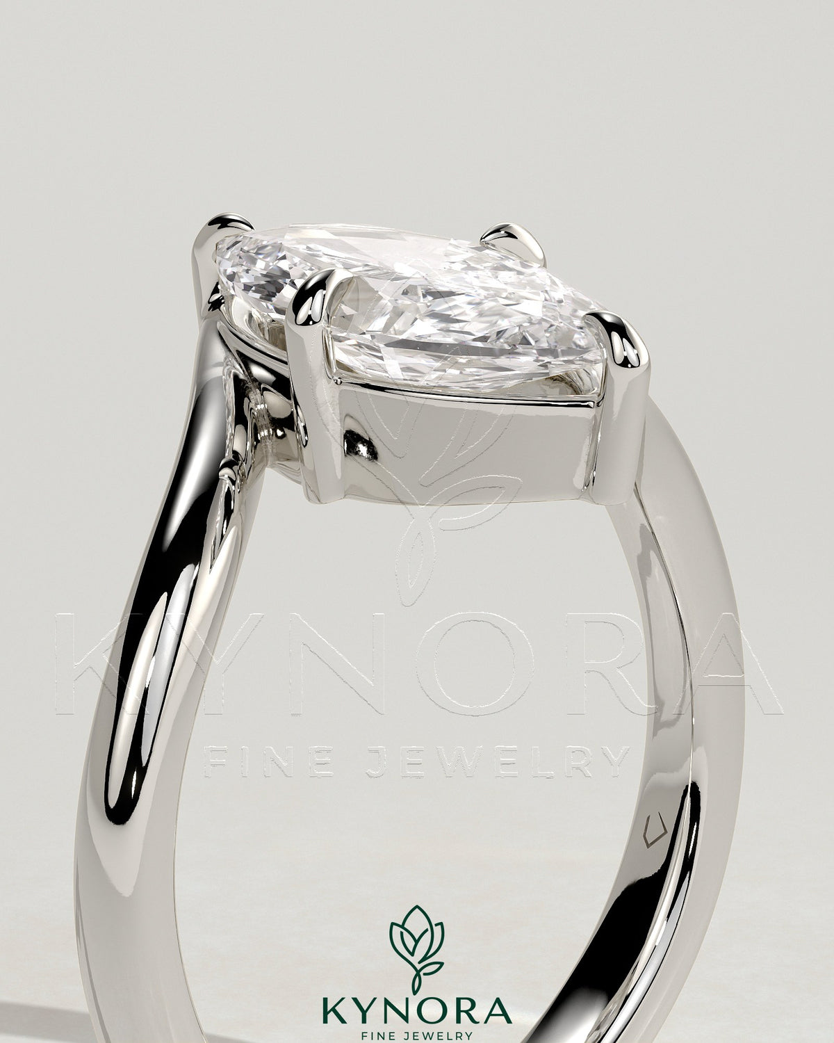 Kynora CJ 2ct marquise diamond claw solitaire engagement ring with bypass band, showcasing elegant design and sparkling gemstone.