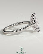 Kynora CJ 2ct marquise claw solitaire engagement ring with cathedral high setting showcasing a sparkling marquise diamond.