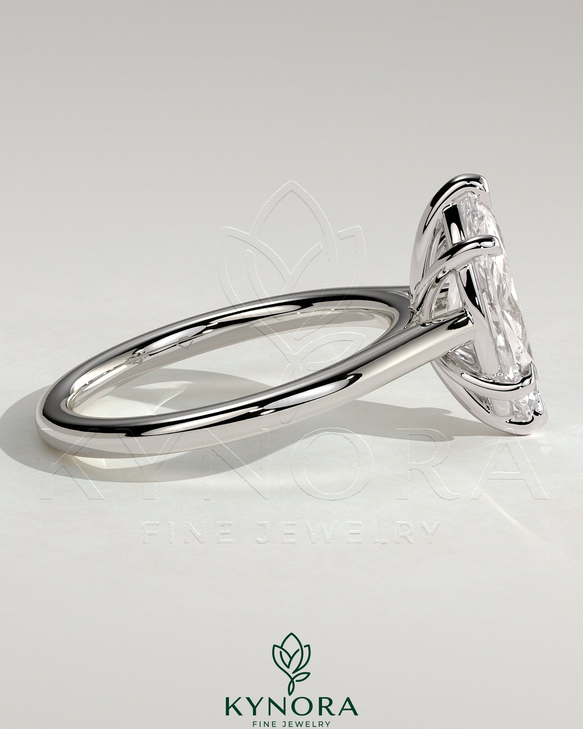 Kynora CJ 2ct marquise claw solitaire engagement ring with cathedral high setting showcasing a sparkling marquise diamond.