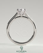 Kynora CJ 2ct marquise diamond solitaire engagement ring with cathedral high setting and intricate band design.