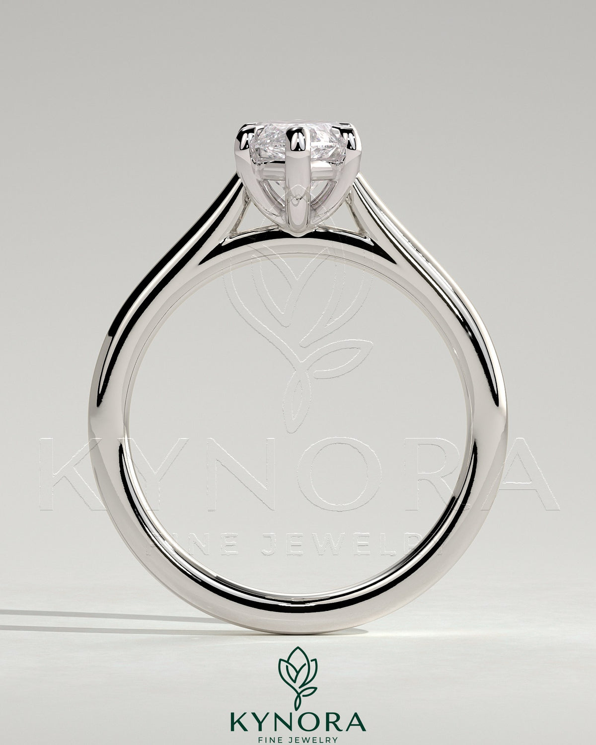 Kynora CJ 2ct marquise diamond solitaire engagement ring with cathedral high setting and intricate band design.