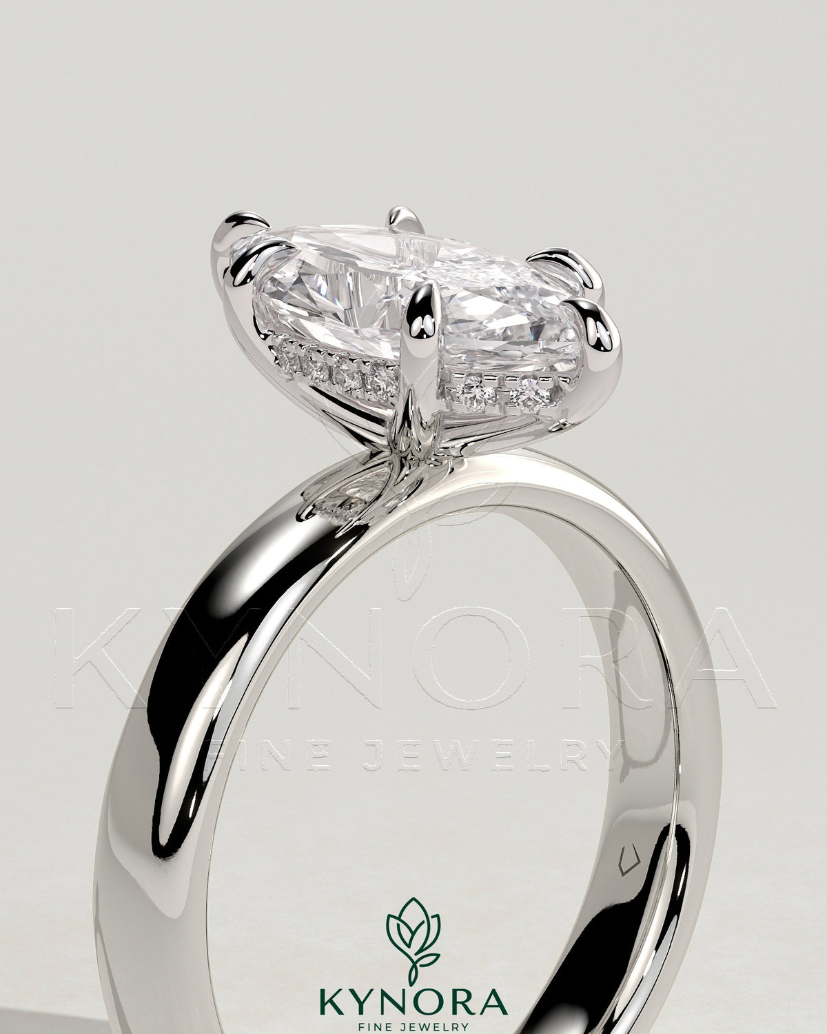 Kynora CJ 2ct marquise solitaire engagement ring with cigar band and hidden halo design, featuring a sparkling central diamond.