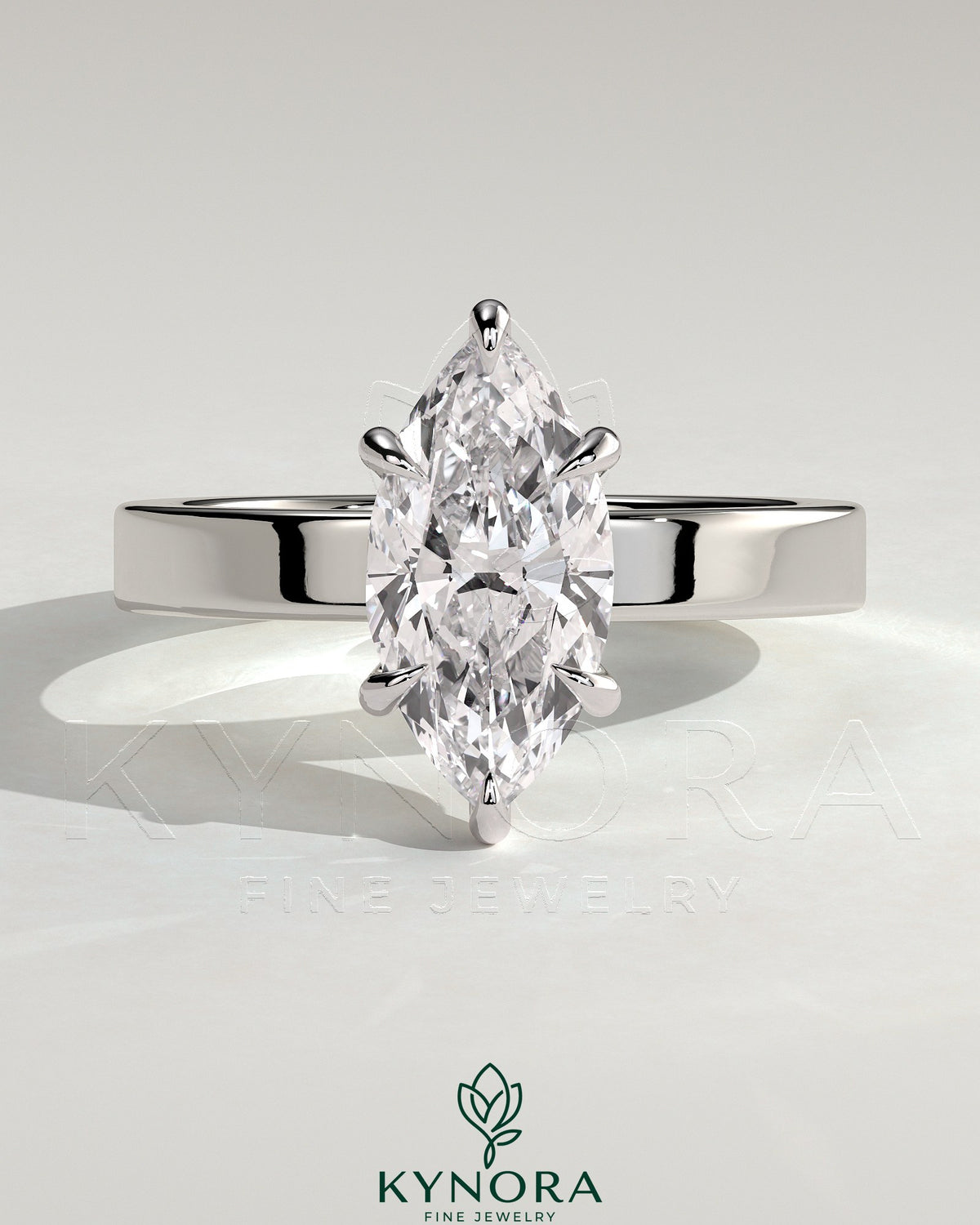 Kynora CJ 2-carat marquise claw solitaire engagement ring with flat cigar band and hidden halo, showcasing a sparkling marquise diamond. Main image