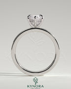 Kynora CJ 2ct marquise solitaire engagement ring with flat cigar band and hidden halo, showcasing elegant diamond design.