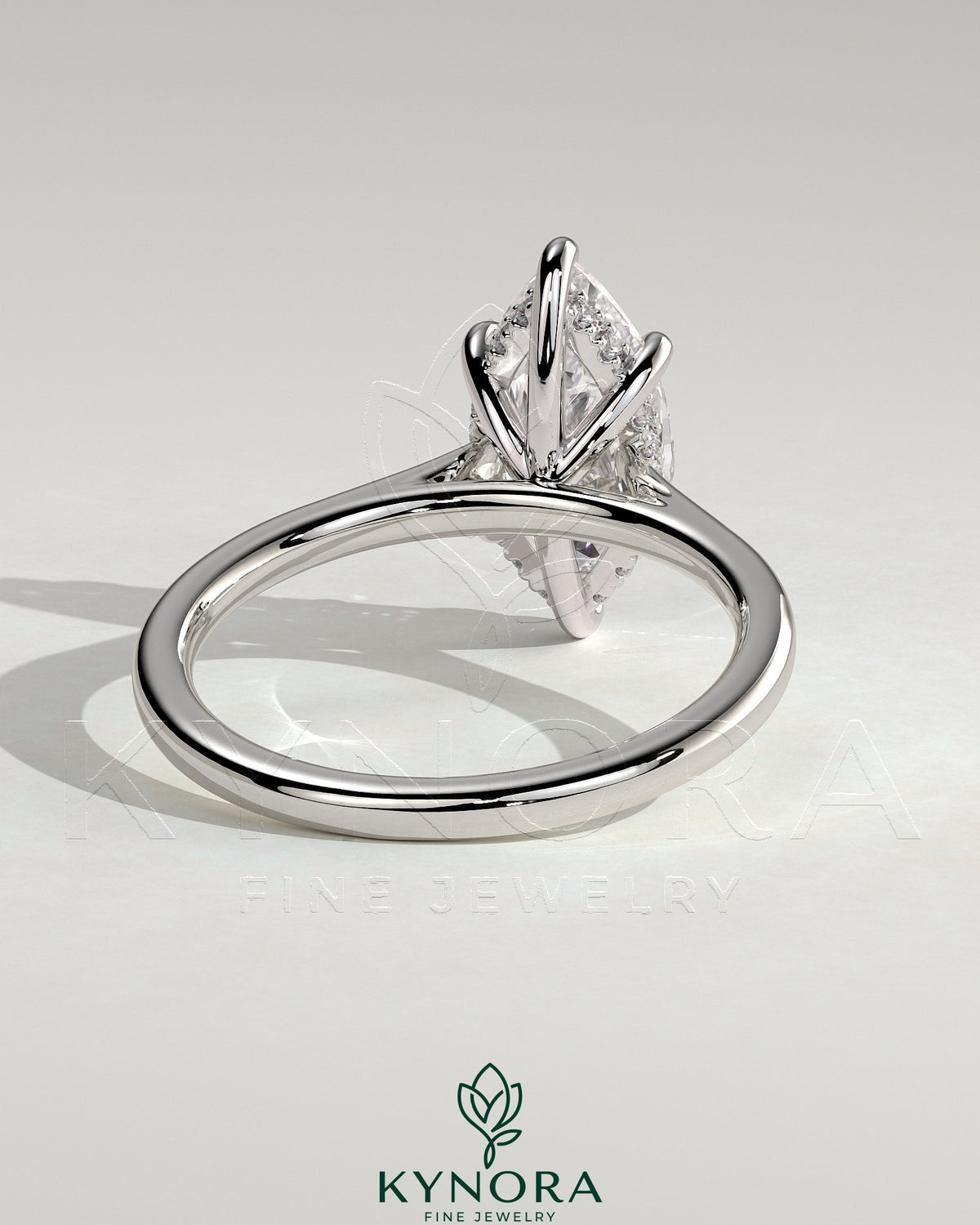 Kynora CJ 2ct marquise diamond solitaire ring with hidden halo and cathedral high setting, elegant engagement ring.