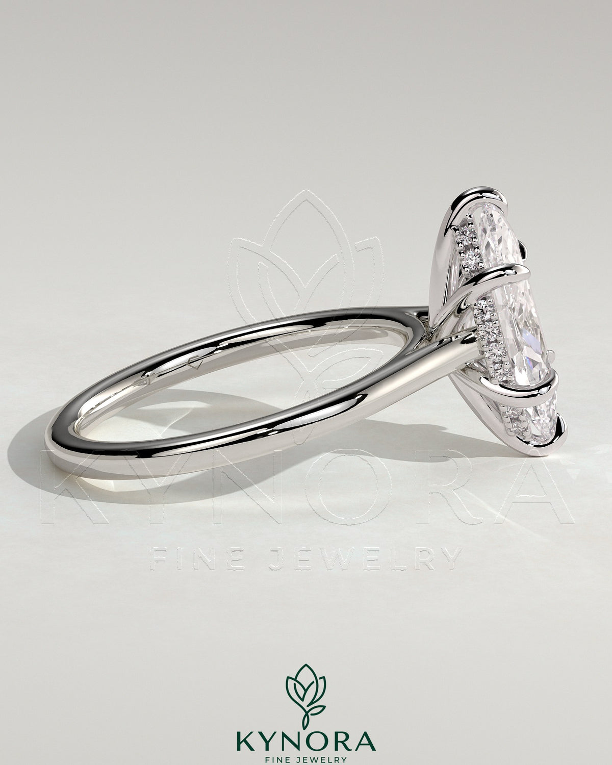 Kynora CJ 2ct marquise cut solitaire engagement ring with hidden halo and cathedral high setting, showcasing elegant jewelry craftsmanship.
