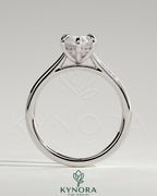Kynora CJ 2ct marquise diamond claw solitaire engagement ring with hidden halo and cathedral high setting.