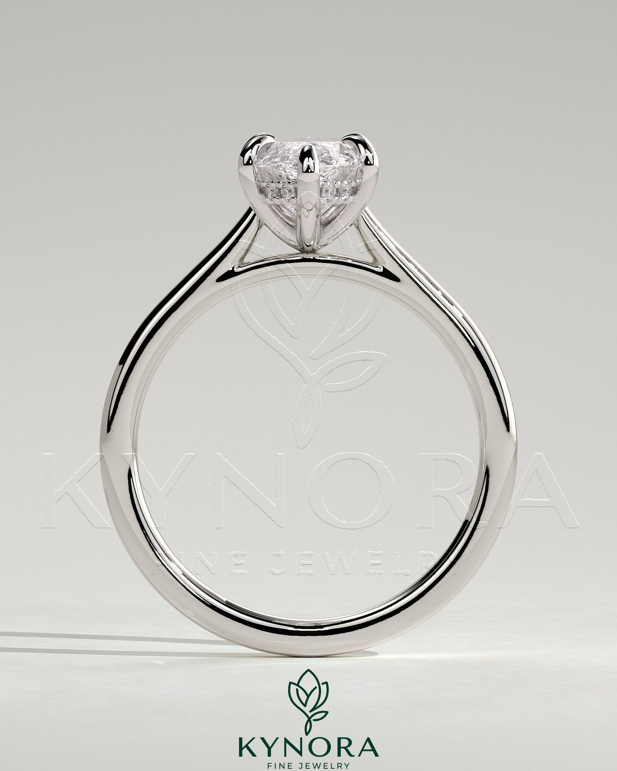 Kynora CJ 2ct marquise diamond claw solitaire engagement ring with hidden halo and cathedral high setting.